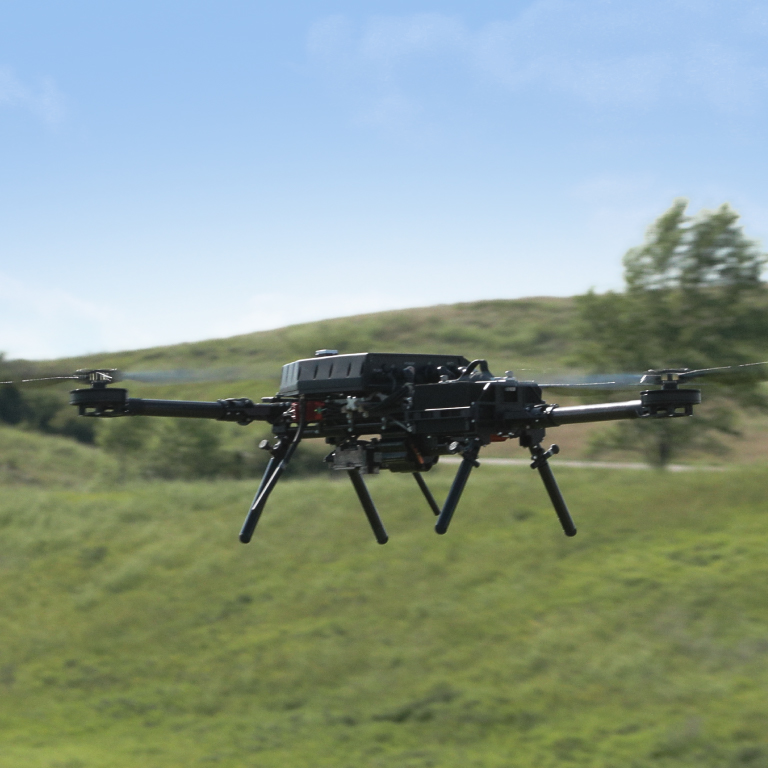 A small unmanned vehicle in flight near the ground